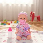 Bebe Bebote Con Sonidos Y Accesorios Muñeca Rie Y Habla
